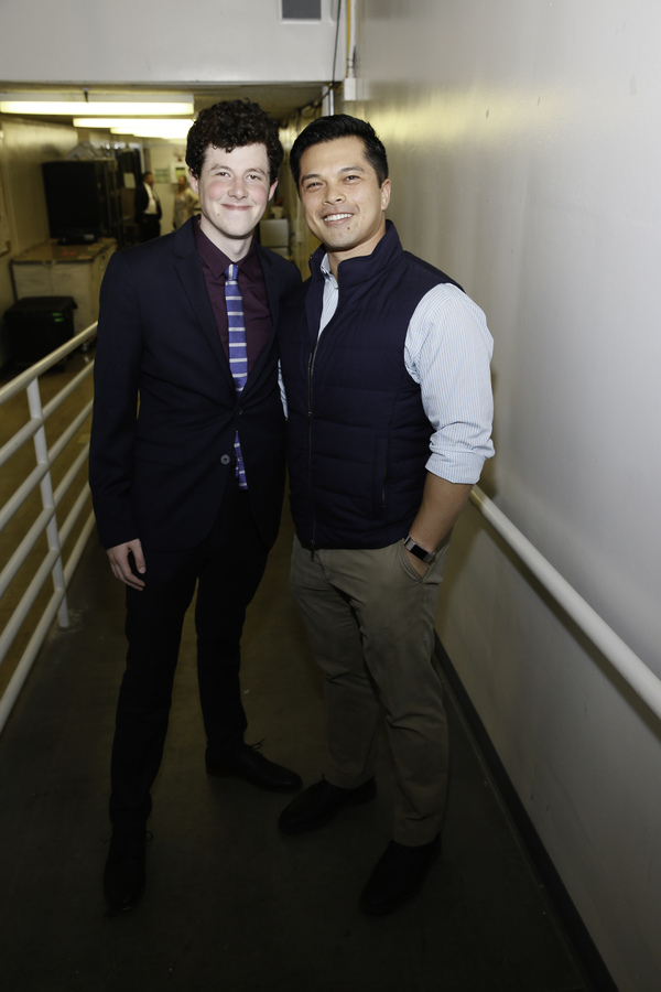 From left, cast member Adam Langdon and actor Vincent Rodriguez III pose back stage a Photo