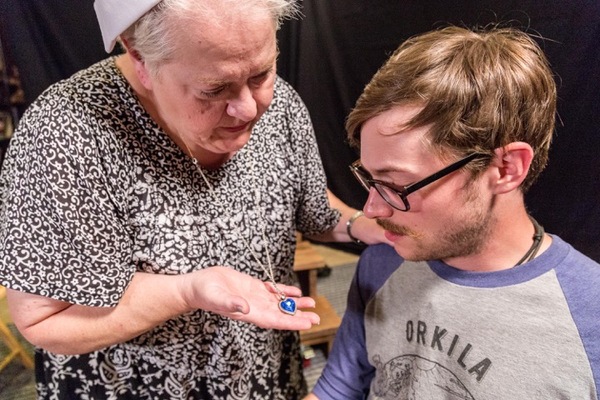 A GI nurse (Karen Hauser) shares a special story with a wounded WWII soldier (Matt Ho Photo