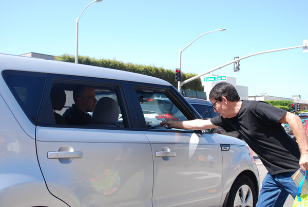 Anson Williams hands out Alert Drops and Drowsy Driving information on PCH
 Photo