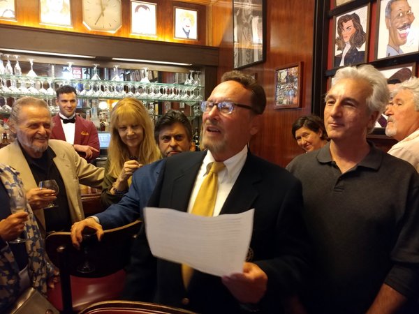 Peter Kingsley, Boy of The Lambs, reads the proclamation aloud, Shepherd Marc Baron t Photo