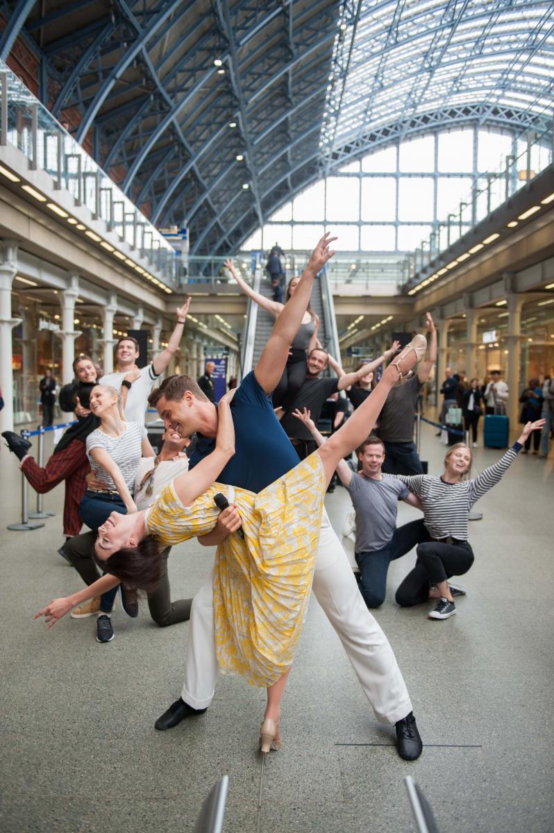 TV: AN AMERICAN IN PARIS Stars Ashley Day, Leanne Cope and More Surprise Passers-by with Performance at St Pancras Image