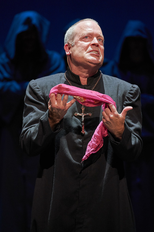 Dom Claude Frollo (Tom Ford*) struggles with newfound temptation. Photo