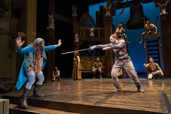 Clopin Trouillefou (Alex Syiek*) is confronted by Phoebus De Martin (Jon Loya*) with  Photo