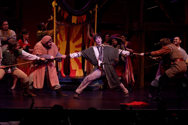 Andrew Keeler as Quasimodo and the ensemble of Hunchback of Notre Dame Photo