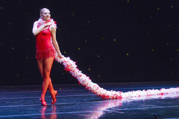 Smuin dancer Erica Felsch struts across the stage with
the world's longest feather bo Photo