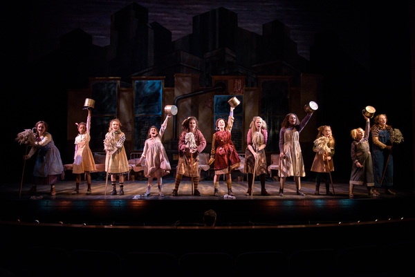  KyLee Hennes, center (Annie in SKY cast) performs with the SKY cast of Annie in rehe Photo