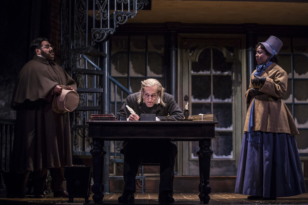 Jonah Winston (Ortle), Larry Yando (Ebenezer Scrooge) and Penelope Walker (Mrs. Crumb Photo