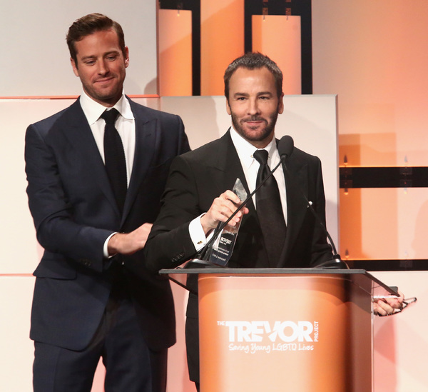 Honoree Tom Ford accepts the Hero Award from Armie Hammer Photo