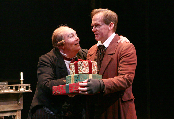 David Coffee (Ebenezer Scrooge) and Russell Garrett (Bob Cratchit) Photo