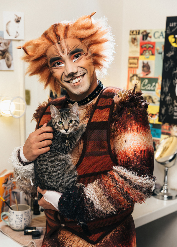 Aaron J. Albano of the CATS cast and an adoptable shelter kitten from The Humane Soci Photo