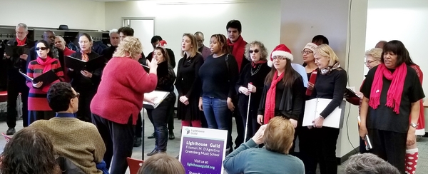 Lighthouse Guild's Vocal Ensemble Spreads Holiday Cheer During One-Day Caroling Tour In Manhattan Image