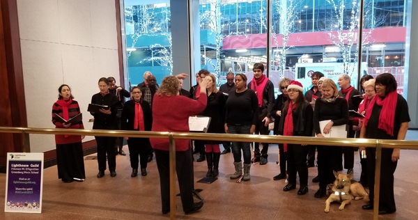Lighthouse Guild's Vocal Ensemble Spreads Holiday Cheer During One-Day Caroling Tour In Manhattan Image