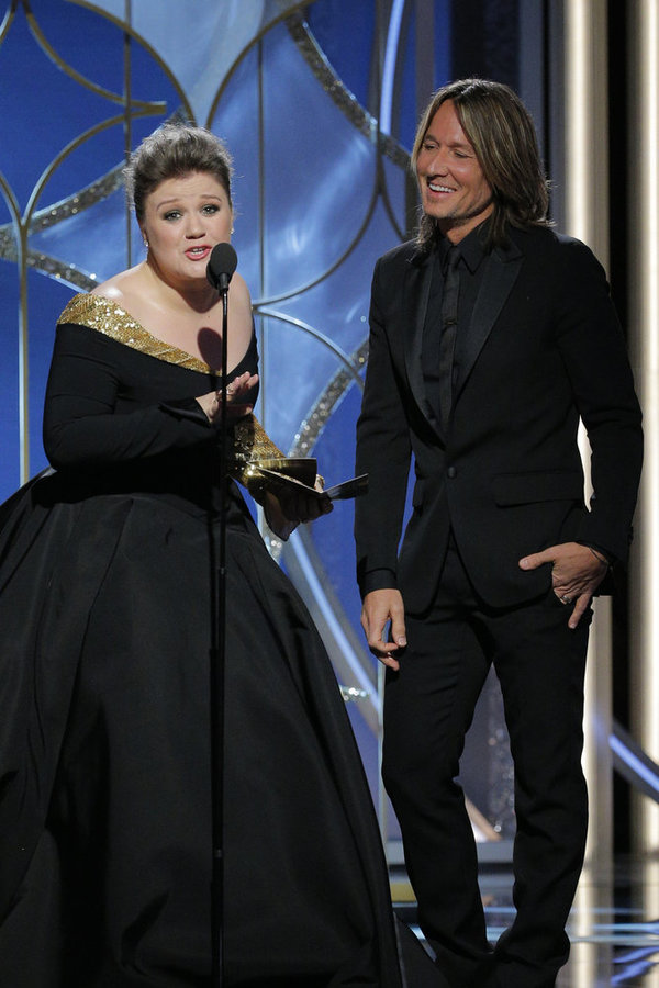75th ANNUAL GOLDEN GLOBE AWARDS -- Pictured: (l-r) Kelly Clarkson, Keith Urban, Prese Photo