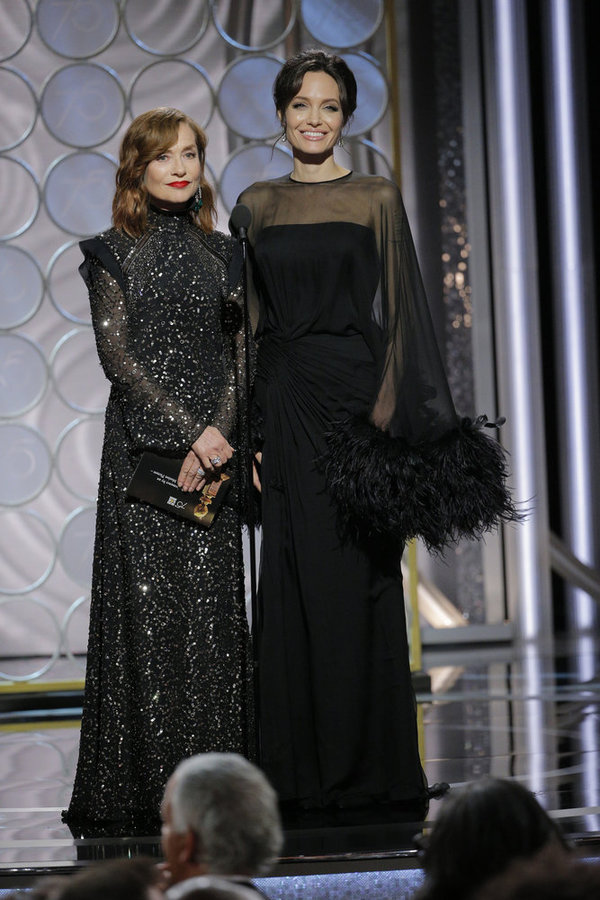 75th ANNUAL GOLDEN GLOBE AWARDS -- Pictured: (l-r) Isabelle Huppert, Angelina Jolie,  Photo