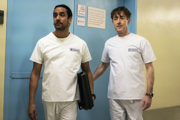 (L-R) Naveen Andrews as Julian Cousins and Alan Cumming as Dr. Dylan Reinhart /Photo  Photo