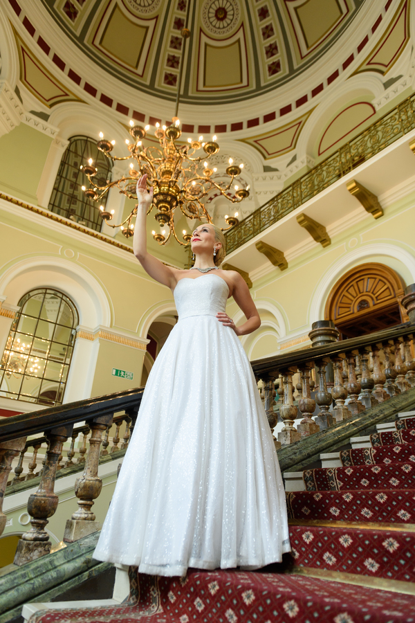 Photo Flash: Madalena Alberto Surprises Shoppers With Showstopping EVITA Performance Image