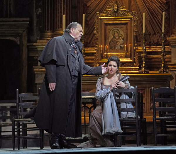 Michael Volle as Scarpia and Anna Netrebko in the title role of Puccini's "Tosca." Ph Photo