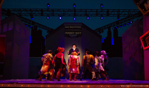 Matthew McGee as Max Bialystock with the cast of The Producers Photo