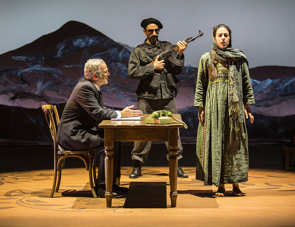 (from left) Joseph Kamal as Interrogator, Antoine Yared as Militiaman, and Nadine Mal Photo