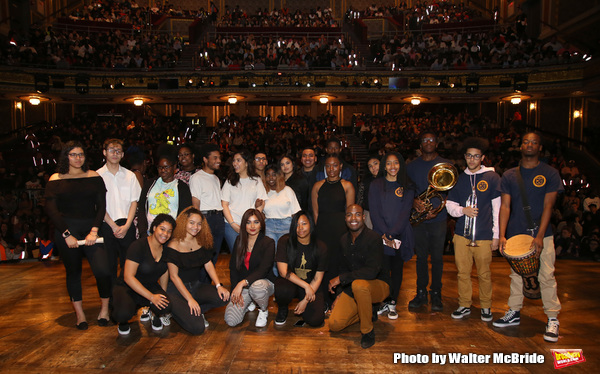 MC Host Justin Dine Bryant with student performers Photo