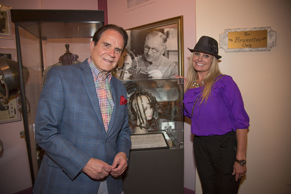 The Legendary Rich Little with daughter Bria Little pose with image of the building n Photo
