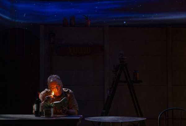 Piet (Victor Talmadge) reads by the light of a flame in "A Lesson From Aloes," perfor Photo