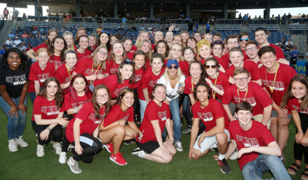 Kristin Chenoweth and the 2018 KCBBC Campers and Staff get ready to sing the National Photo