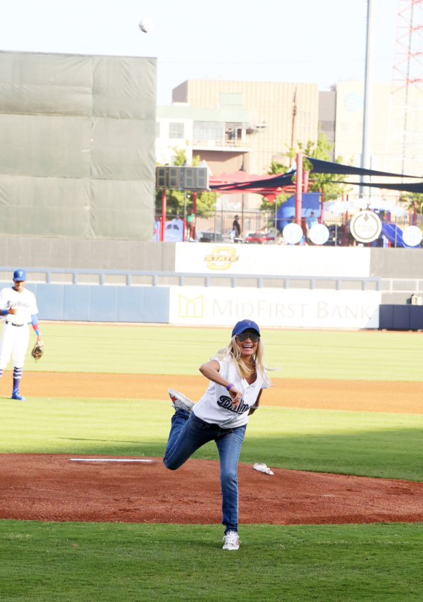 Kristin Chenoweth throws the first pitch. Photo