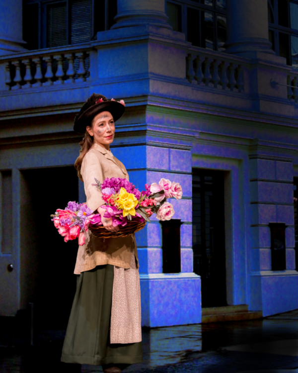 Eliza Doolittle (Alicia Teeter) sings Wouldn't It Be Loverly to be warm and cozy on a Photo