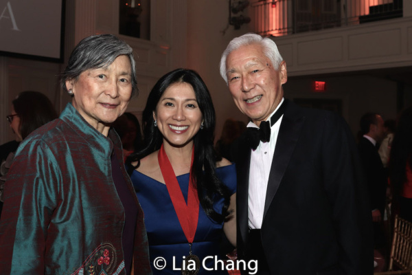 Honoree Dr. H.M. Agnes Hsu-Tang is flanked by her sister-in-law Connie Fong and her h Photo