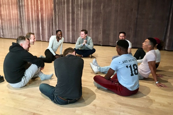 Choreographer Raja Feather Kelly and director Kevin Newbury have a rehearsal discussion with the Good Swimmer Choir: Jeremy Weiss, Sophia Byrd, Naseer Sleets, Joey LaPlante, Luke Bob Robinson, Papa Holt, and Kennedy Kanagawa. Photo by Cindy Sibilsky. at 