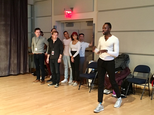 Choreographer Raja Feather Kelly instructs The Good Swimmer Choir. Photo by Cindy Sib Photo