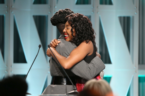 Lupita Nyong'o (L) presents The Black Panther Scholarship to Kalis Coleman Photo