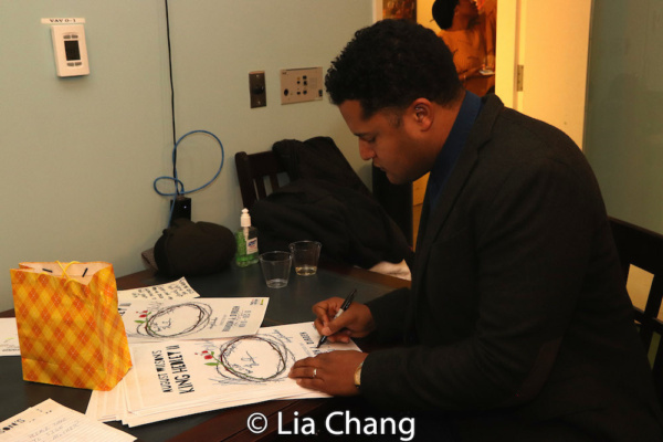 Brandon J. Dirden signs posters Photo