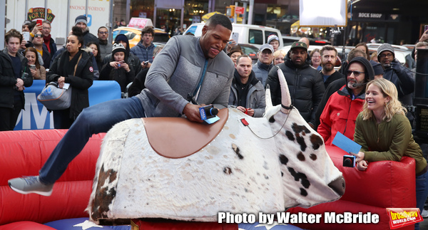 Photo Coverage: GMA DAY Host Michael Strahan Braves Mechanical Bull Ride In Times Square! Image