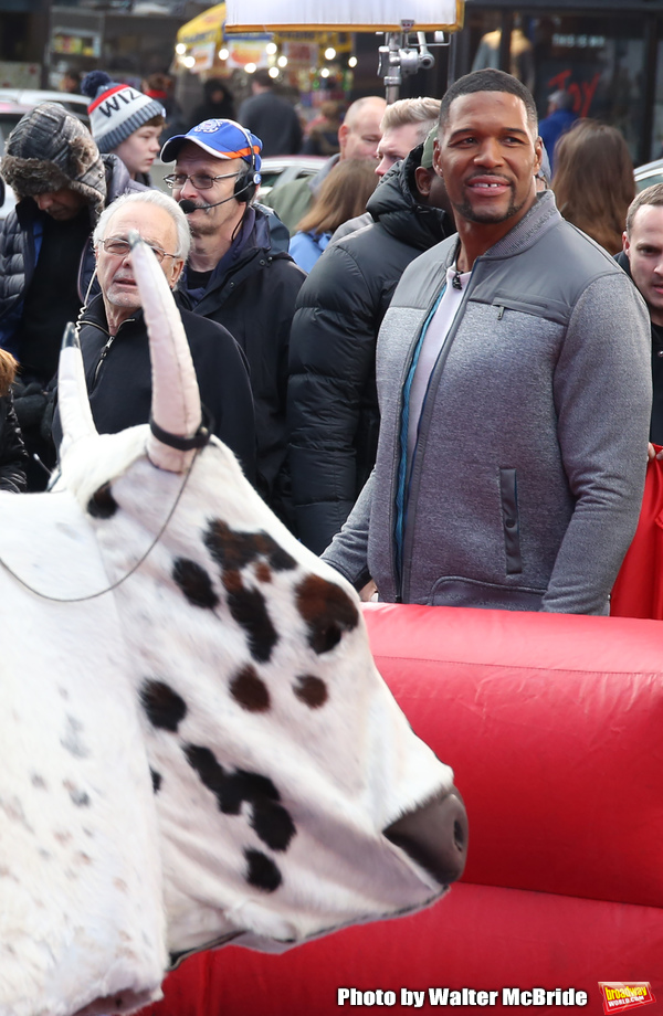 Michael Strahan riding a Mechanical Bull during a Good Morning America filming promot Photo