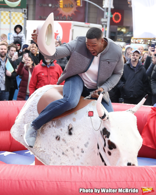 Photo Coverage: GMA DAY Host Michael Strahan Braves Mechanical Bull Ride In Times Square! Image