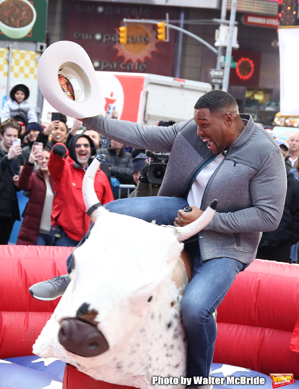 Photo Coverage: GMA DAY Host Michael Strahan Braves Mechanical Bull Ride In Times Square! Image