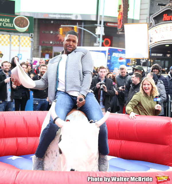 Photo Coverage: GMA DAY Host Michael Strahan Braves Mechanical Bull Ride In Times Square! Image