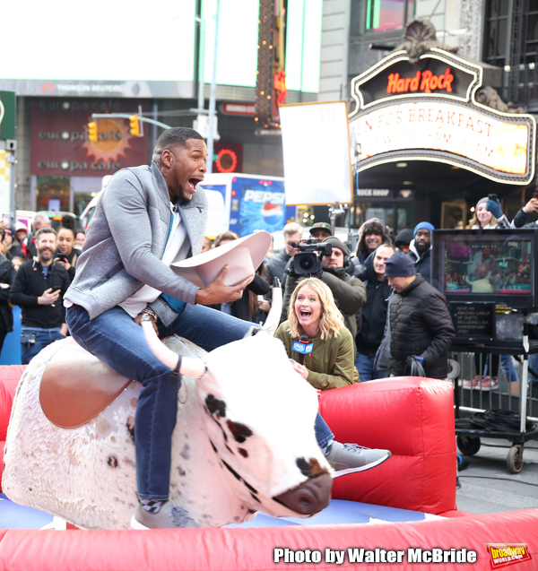 Photo Coverage: GMA DAY Host Michael Strahan Braves Mechanical Bull Ride In Times Square! Image