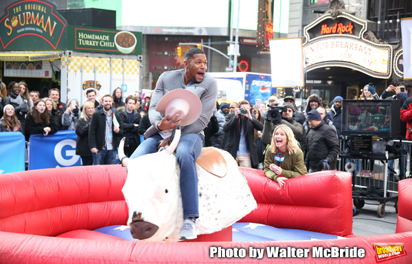 Photo Coverage: GMA DAY Host Michael Strahan Braves Mechanical Bull Ride In Times Square! Image