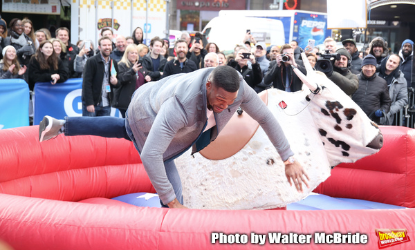 Photo Coverage: GMA DAY Host Michael Strahan Braves Mechanical Bull Ride In Times Square! Image