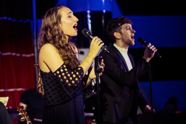 Emma Kingston and Greg Bernstein sing ''Who Is That Boy?'' Photo