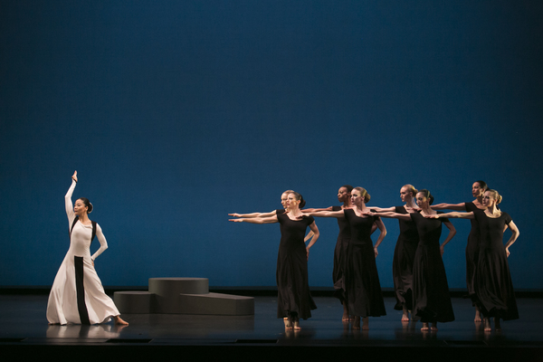 Xin Ying (soloist) and company in Martha Graham's Chronicle. Photo by Melissa Sherwoo Photo