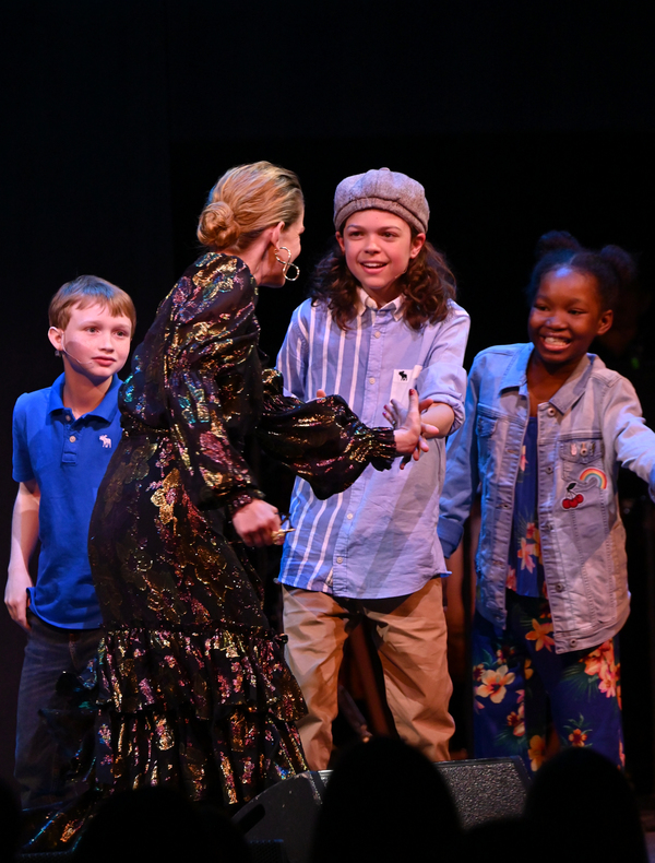 Anna Chlumsky greets the campers onstage  Photo