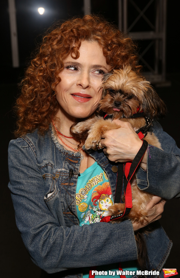 Bernadette Peters with a dog from The Humane Society of New York Photo