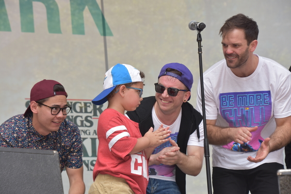 Gerard Canonico and Cameron Bond with some lucky fans on stage Photo