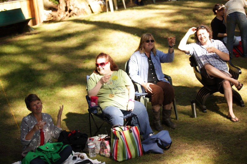 Michelle Durr and friends in the audience of StoryHouse Stage, at an ISF dress rehearsal