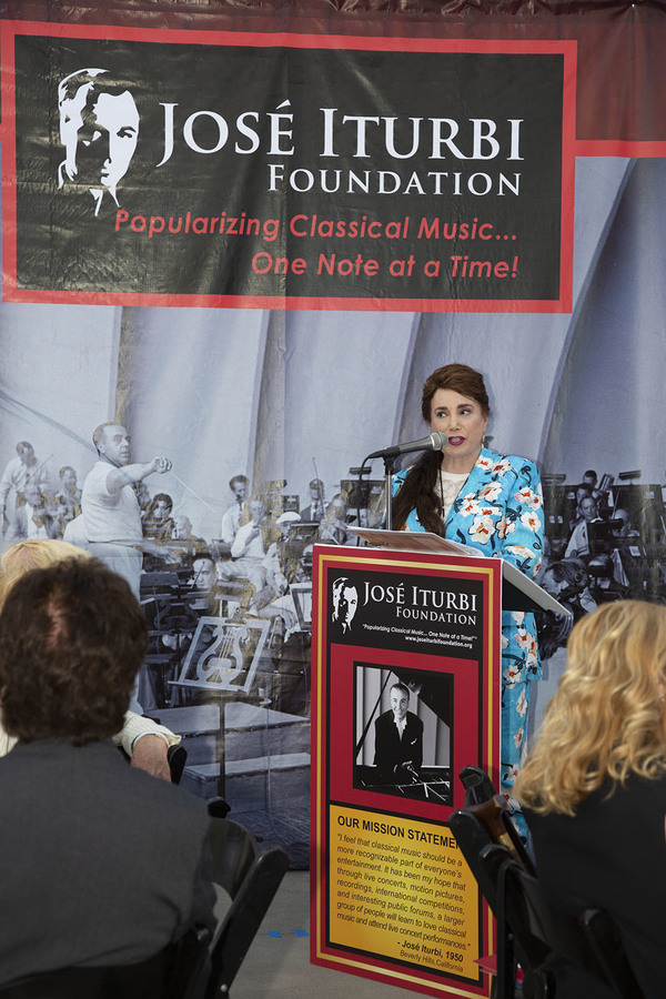 President and co-founder, Donelle Dadigan, addresses the celebrated crowd Photo