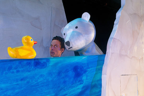 Micah Figueroa flanked by a rubber duckie and a polar bear in â€œ10 Little Rubber Photo